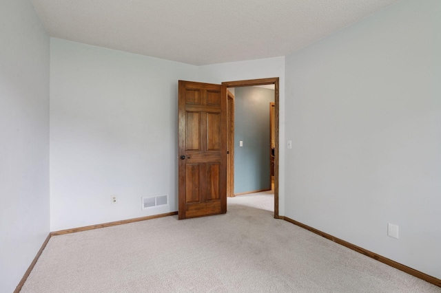 10989 Eagle Lake Blvd, Maple Grove, MN 55369 - unfurnished room featuring light carpet and baseboards