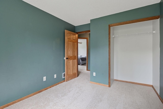 10989 Eagle Lake Blvd, Maple Grove, MN 55369 - unfurnished bedroom featuring carpet floors and a closet