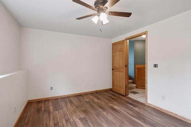 10989 Eagle Lake Blvd, Maple Grove, MN 55369 - unfurnished room featuring wood finished floors and ceiling fan