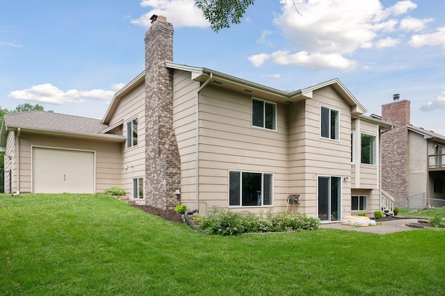10989 Eagle Lake Blvd, Maple Grove, MN 55369 - rear view of house with a chimney, a garage, and a yard
