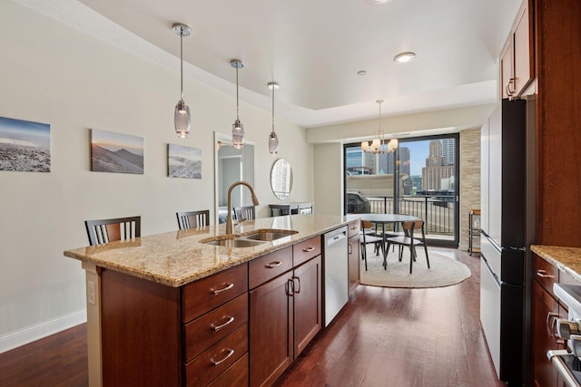 100 3rd Ave S Unit 706, Minneapolis, MN 55401 - kitchen with freestanding refrigerator, dark wood-type flooring, a chandelier, dishwashing machine, and light stone countertops