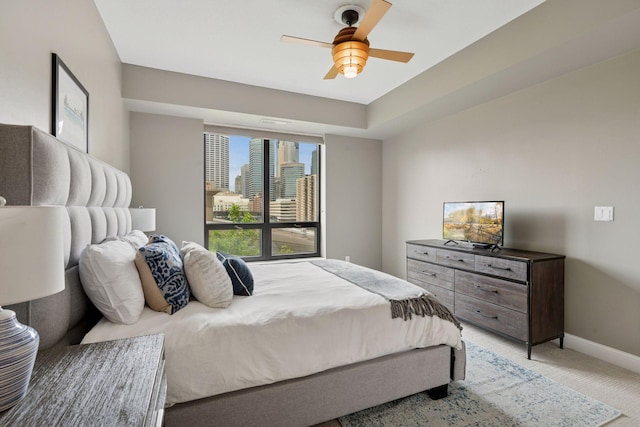 100 3rd Ave S Unit 706, Minneapolis, MN 55401 - bedroom featuring light carpet and a ceiling fan