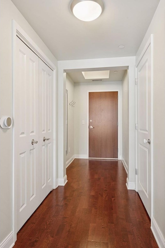 100 3rd Ave S Unit 706, Minneapolis, MN 55401 - hallway with dark wood-style floors and baseboards