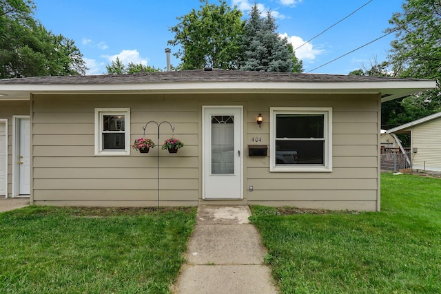 404 2nd St W, Jordan, MN 55352 - view of front facade with a front yard