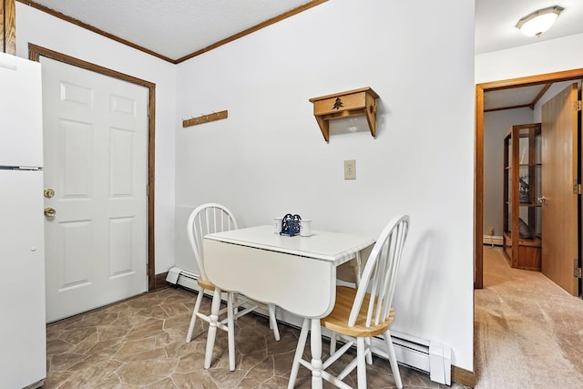 404 2nd St W, Jordan, MN 55352 - dining space featuring crown molding, a baseboard radiator, and light stone finish flooring
