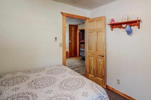 37566 Tulaby Lake Dr, Waubun, MN 56589 - bedroom featuring carpet floors, crown molding, and wood walls