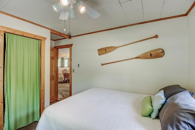 37566 Tulaby Lake Dr, Waubun, MN 56589 - bedroom featuring ornamental molding, carpet floors, and ceiling fan