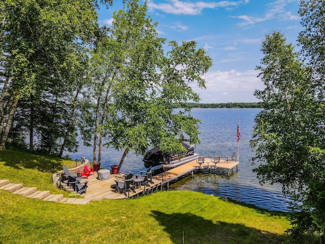 37566 Tulaby Lake Dr, Waubun, MN 56589 - dock area featuring a water view and a lawn