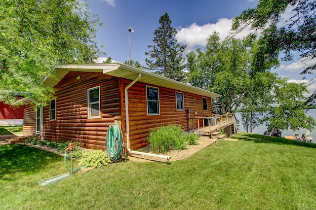 37566 Tulaby Lake Dr, Waubun, MN 56589 - view of home's exterior with a yard and a wooden deck