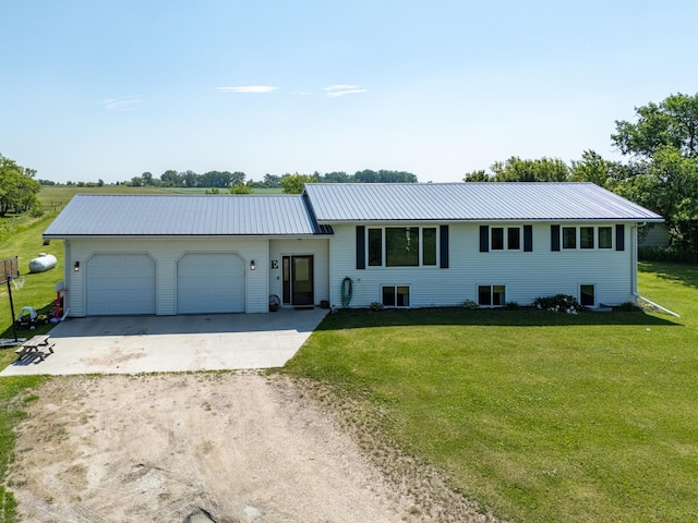28736 160th Ave SW, Kertsonville Twp, MN 56716 - view of front of property with driveway, a front yard, a garage, and a metal roof
