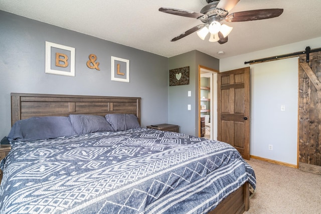 28736 160th Ave SW, Kertsonville Twp, MN 56716 - bedroom featuring a barn door, carpet floors, ceiling fan, and a textured ceiling