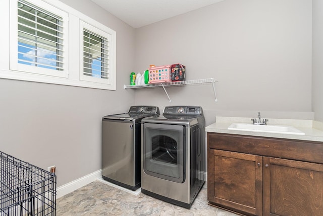 1621 Dutch Lake Dr, Minnetrista, MN 55364 - laundry room featuring washing machine and dryer and cabinet space