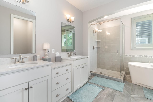 1621 Dutch Lake Dr, Minnetrista, MN 55364 - full bathroom with a shower stall, double vanity, and a freestanding bath
