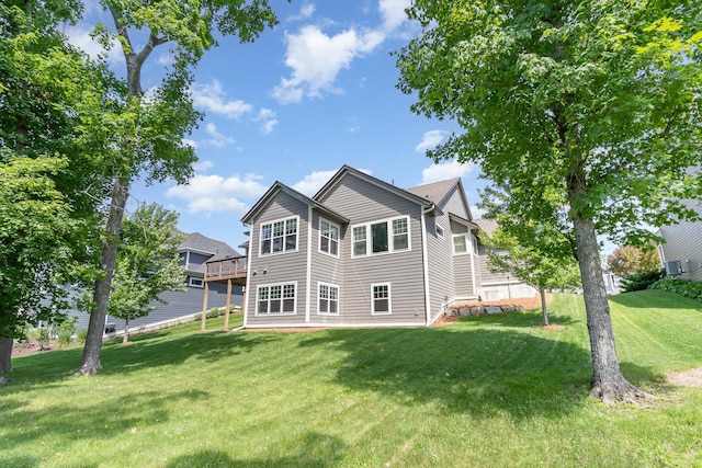 1621 Dutch Lake Dr, Minnetrista, MN 55364 - rear view of house featuring a lawn and a deck