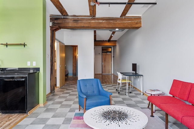 406 Wacouta St Unit 611, Saint Paul, MN 55101 - living area featuring light floors and beamed ceiling