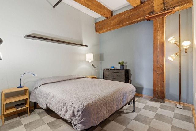 406 Wacouta St Unit 611, Saint Paul, MN 55101 - bedroom featuring light flooring and beam ceiling