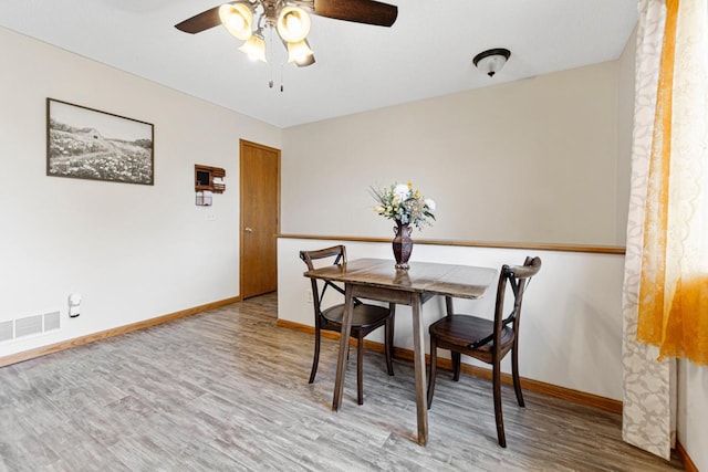 2115 Turpin St, Saint Peter, MN 56082 - dining space featuring wood finished floors and a ceiling fan