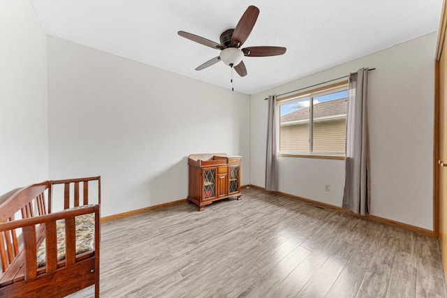 2115 Turpin St, Saint Peter, MN 56082 - bedroom featuring light wood-style flooring and ceiling fan