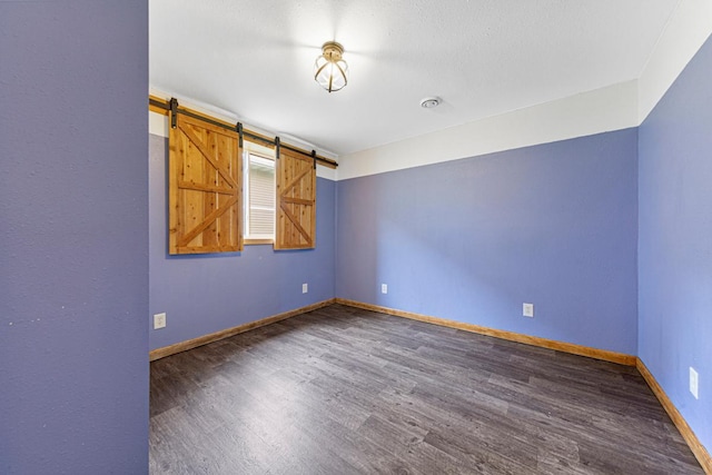 2115 Turpin St, Saint Peter, MN 56082 - spare room with wood finished floors and baseboards