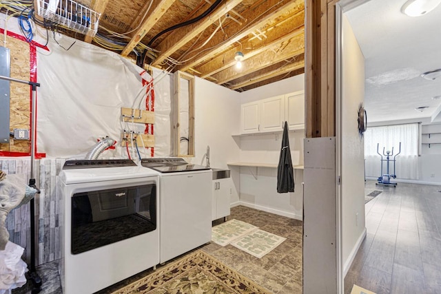 2115 Turpin St, Saint Peter, MN 56082 - laundry room featuring cabinet space and washing machine and clothes dryer