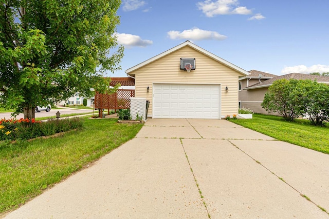 2115 Turpin St, Saint Peter, MN 56082 - view of front of house with a garage, a front lawn, and driveway