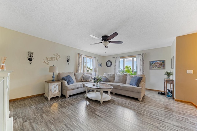 2115 Turpin St, Saint Peter, MN 56082 - living room with ceiling fan, wood finished floors, and a textured ceiling