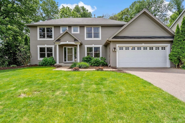 5245 Dufferin Dr, Savage, MN 55378 - colonial house with asphalt driveway, a garage, and a front lawn