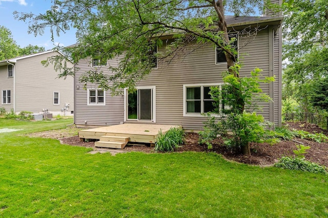 5245 Dufferin Dr, Savage, MN 55378 - back of house featuring a wooden deck, a yard, and a chimney
