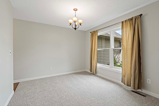 5245 Dufferin Dr, Savage, MN 55378 - carpeted empty room with a chandelier and a textured ceiling