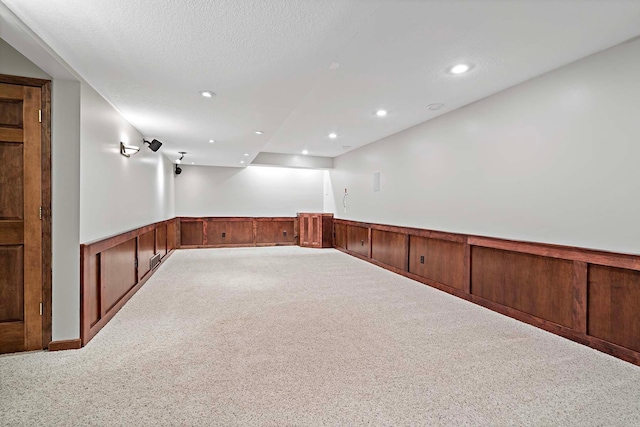 5245 Dufferin Dr, Savage, MN 55378 - carpeted empty room with a wainscoted wall and recessed lighting