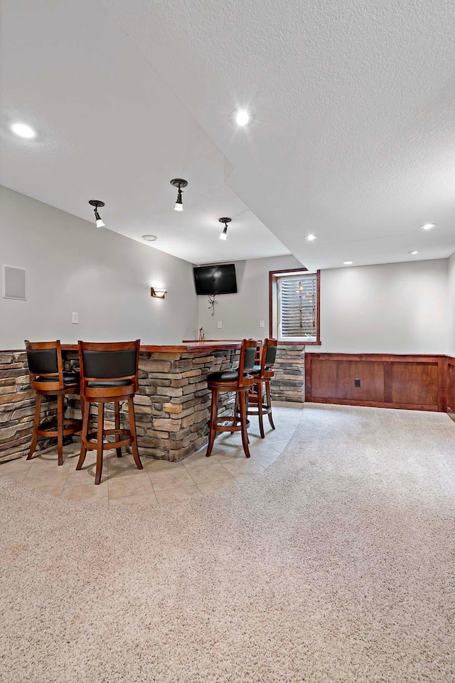 5245 Dufferin Dr, Savage, MN 55378 - indoor wet bar with a textured ceiling and recessed lighting