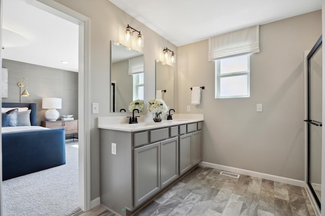 14409 103rd Ln N, Maple Grove, MN 55369 - bathroom with double vanity and baseboards