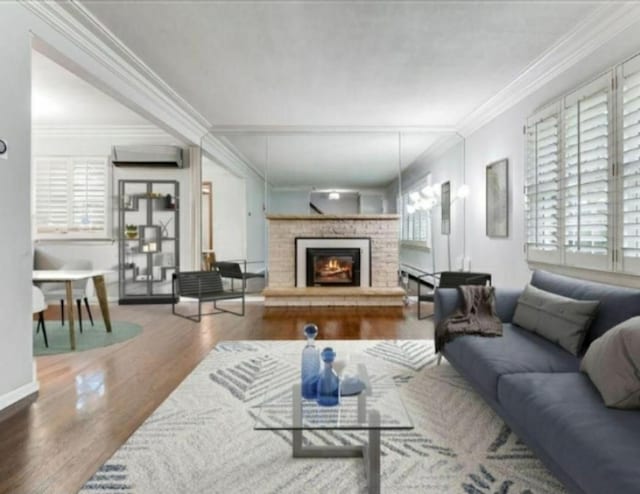 6325 Brookview Ave, Edina, MN 55424 - living room with ornamental molding, wood finished floors, a wall unit AC, and a brick fireplace
