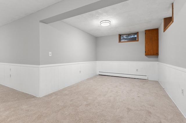 6325 Brookview Ave, Edina, MN 55424 - spare room with baseboard heating, wainscoting, and carpet