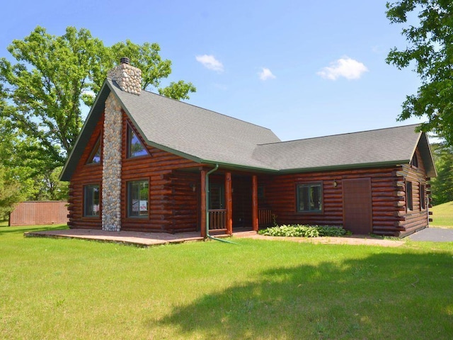 17771 State 34, Park Rapids, MN 56470 - log cabin featuring log exterior, a chimney, and a shingled roof