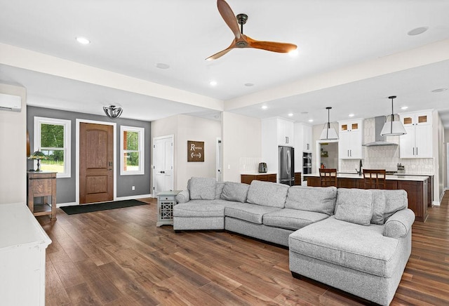 4335 Spring View Dr, Moose Lake, MN 55767 - living room featuring dark wood-style flooring, a ceiling fan, and recessed lighting