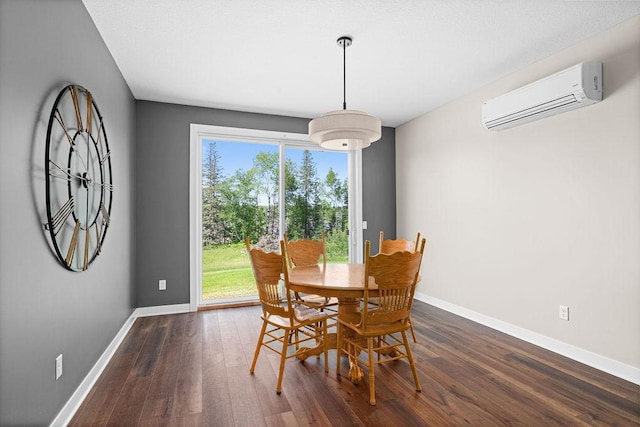 4335 Spring View Dr, Moose Lake, MN 55767 - dining room with a wall unit AC and dark wood-type flooring