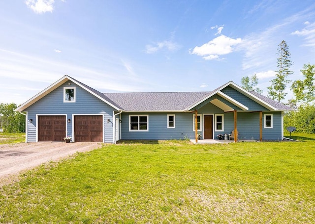 4335 Spring View Dr, Moose Lake, MN 55767 - view of front of home featuring dirt driveway, a front yard, a garage, and a shingled roof