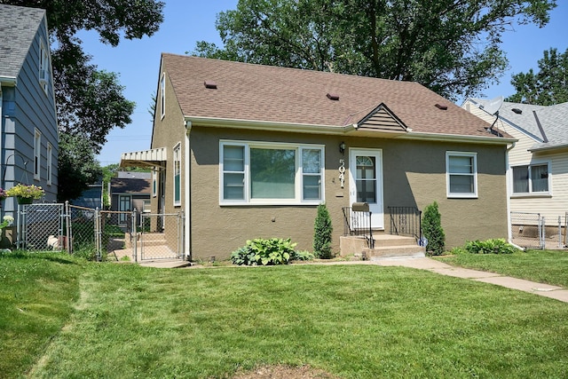 5041 Upton Ave N, Minneapolis, MN 55430 - view of front facade featuring a gate, stucco siding, and a shingled roof