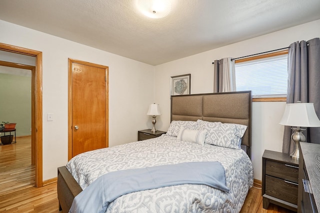 5041 Upton Ave N, Minneapolis, MN 55430 - bedroom featuring light wood finished floors and baseboards