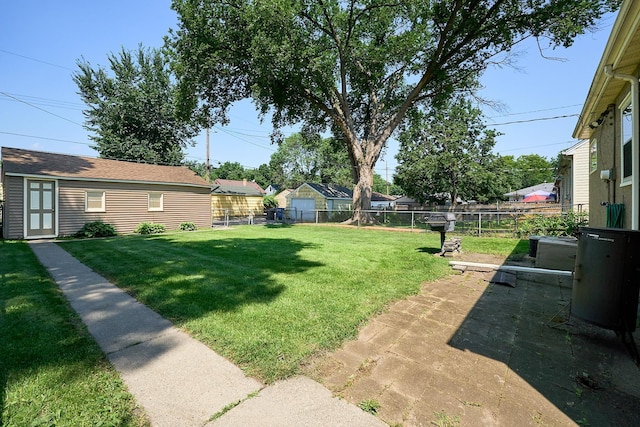 5041 Upton Ave N, Minneapolis, MN 55430 - fenced backyard featuring an outdoor structure