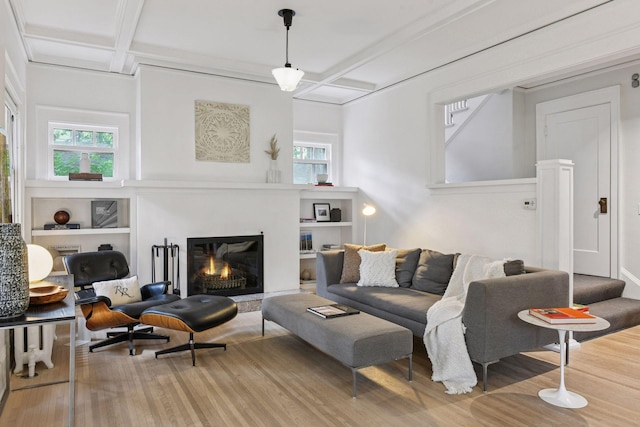 4626 Dupont Ave S, Minneapolis, MN 55419 - living area with coffered ceiling, wood finished floors, healthy amount of natural light, a glass covered fireplace, and beam ceiling