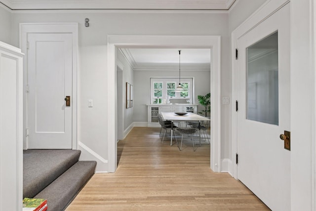 4626 Dupont Ave S, Minneapolis, MN 55419 - hallway with crown molding and light wood-style floors