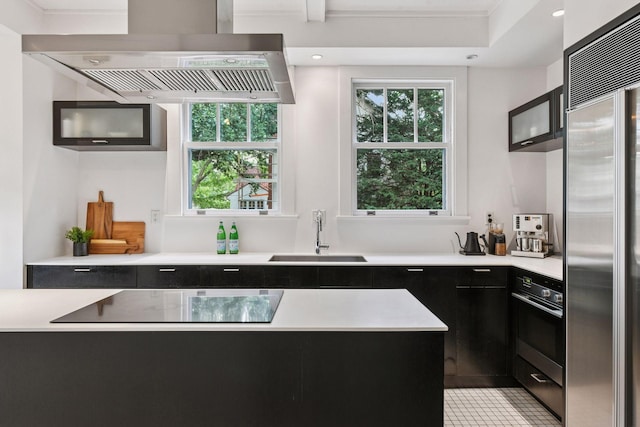 4626 Dupont Ave S, Minneapolis, MN 55419 - kitchen featuring black appliances, exhaust hood, dark cabinetry, healthy amount of natural light, and recessed lighting