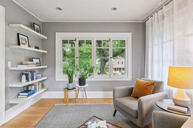 4626 Dupont Ave S, Minneapolis, MN 55419 - living area with healthy amount of natural light, ornamental molding, wood finished floors, and recessed lighting