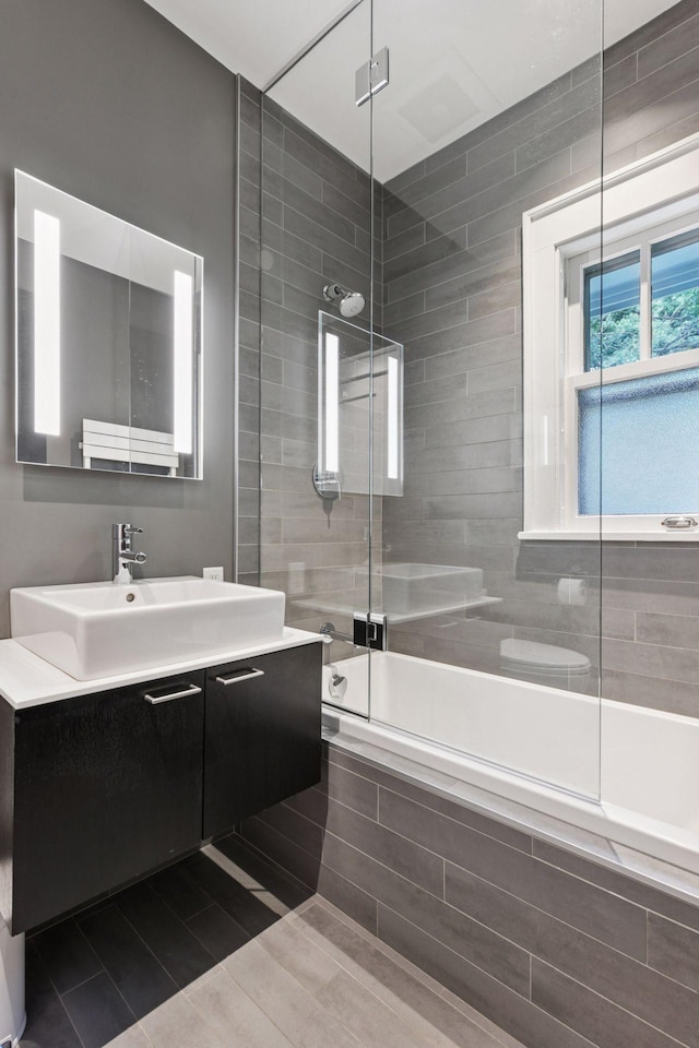 4626 Dupont Ave S, Minneapolis, MN 55419 - bathroom featuring vanity and tiled shower / bath