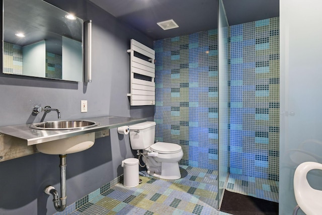 4626 Dupont Ave S, Minneapolis, MN 55419 - full bath with radiator, a tile shower, and tile patterned flooring