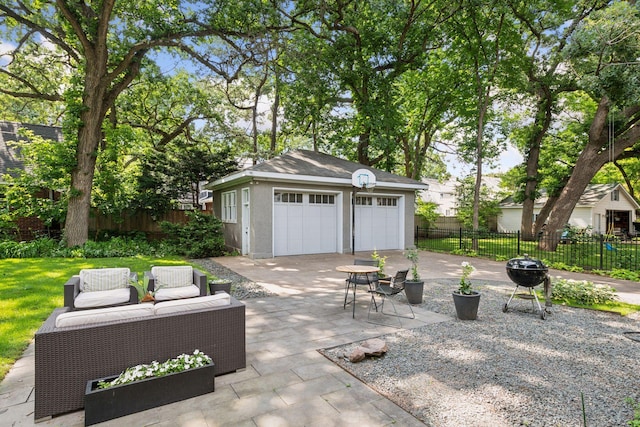 4626 Dupont Ave S, Minneapolis, MN 55419 - view of patio / terrace featuring an outbuilding, a detached garage, an outdoor living space, and area for grilling