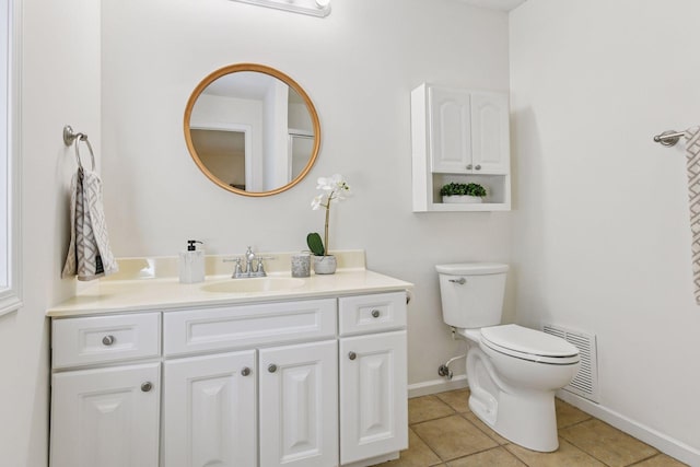 913 Carriage Ln, Chaska, MN 55318 - bathroom with tile patterned floors and vanity