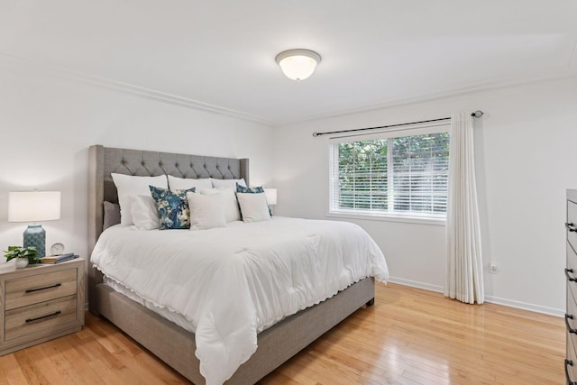 913 Carriage Ln, Chaska, MN 55318 - bedroom featuring light wood-style flooring and baseboards